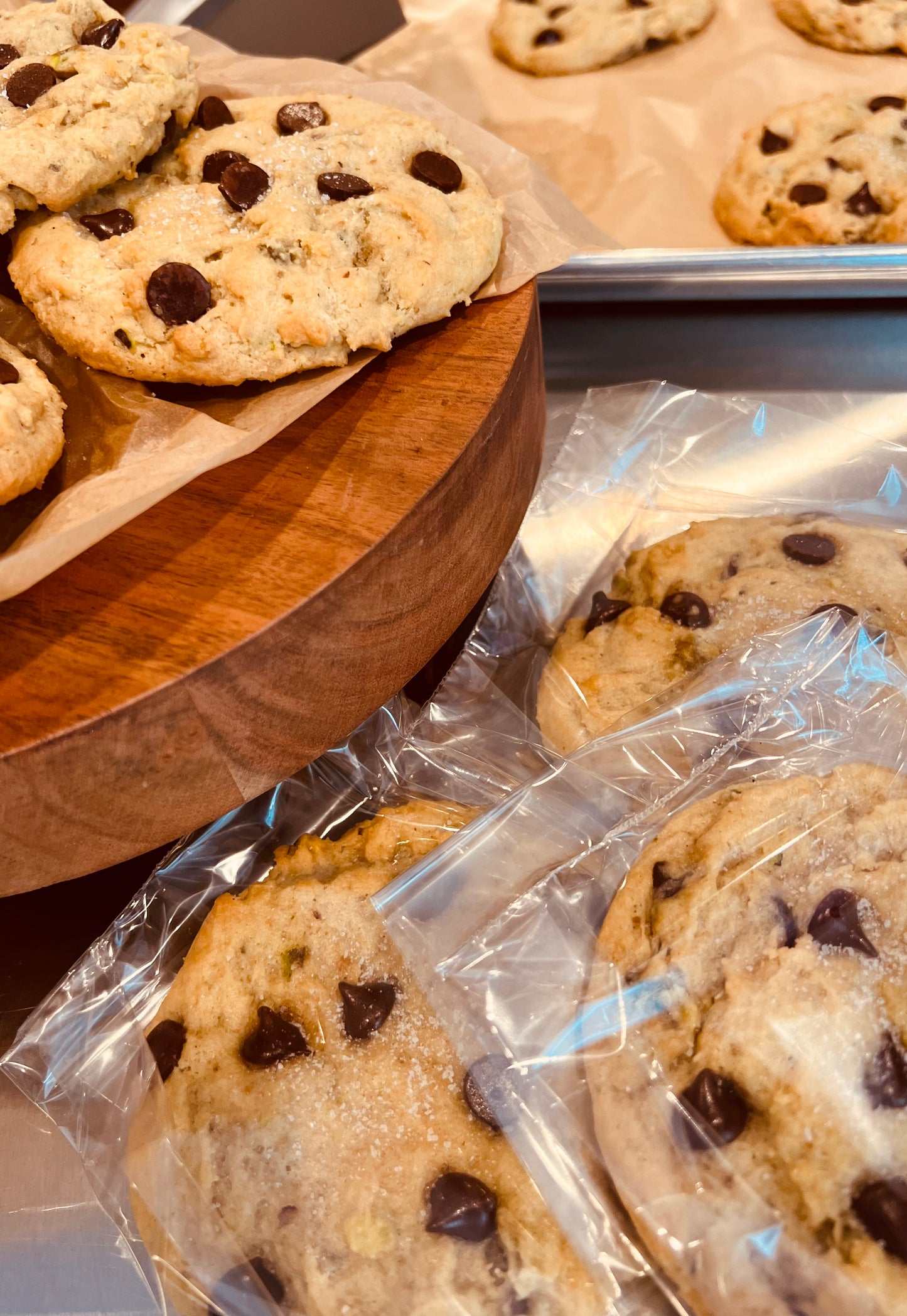 Salted dark chocolate pistachios cookies individually wrapped.  Also displayed on trivet and cookie sheet.