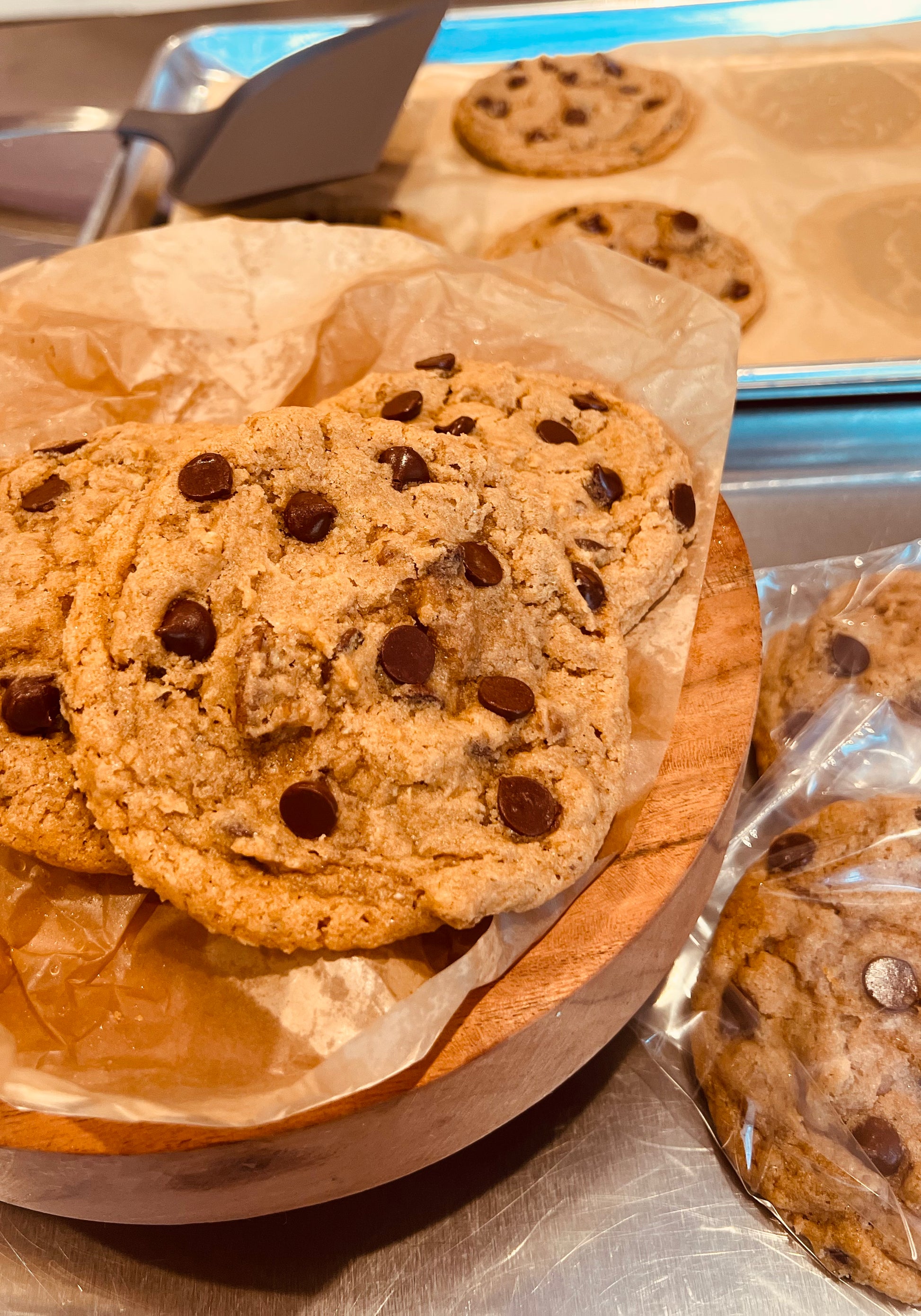 Whole wheat chocolate with pecan cookies individually wrapped.  Also displayed on trivet and cookie sheet.