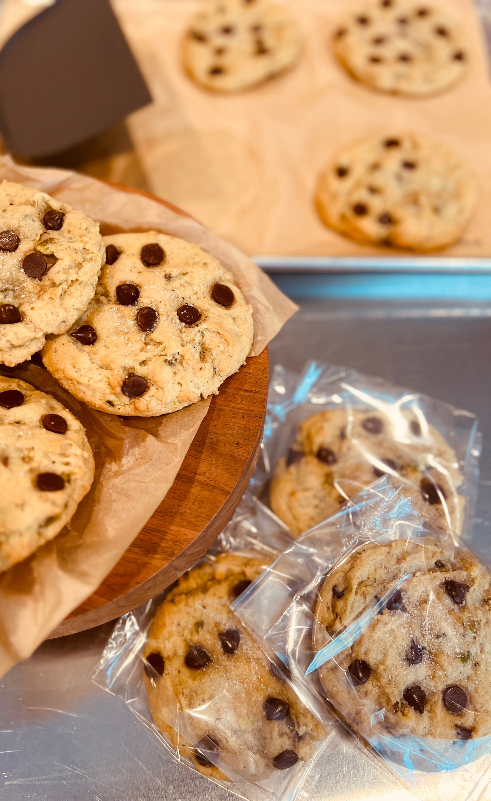 Salted dark chocolate pistachios cookies individually wrapped.  Also displayed on trivet and cookie sheet.