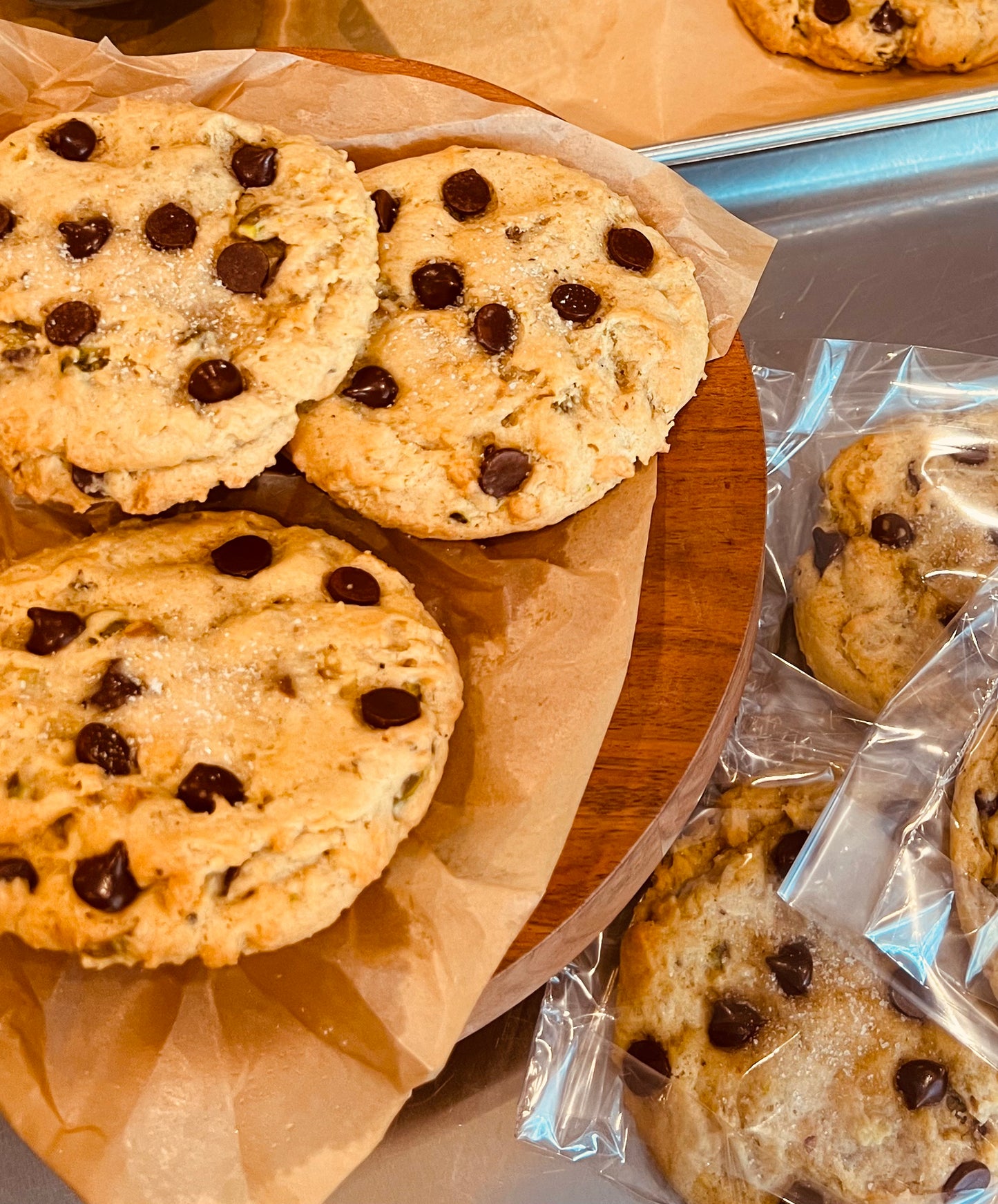 Salted dark chocolate pistachios cookies individually wrapped.  Also displayed on trivet and cookie sheet.