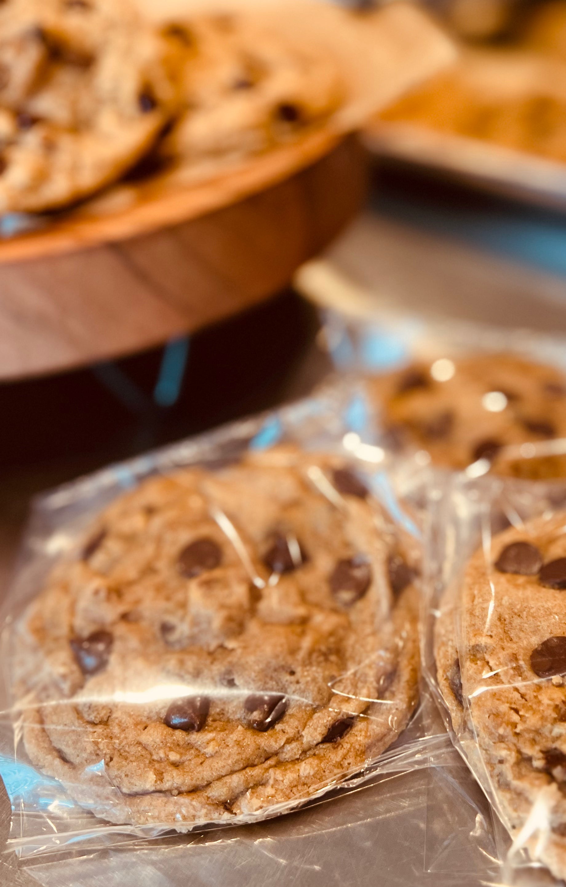 Whole wheat chocolate with pecan cookies individually wrapped.  Also displayed on trivet and cookie sheet.